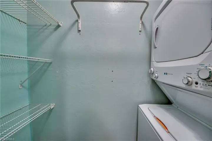 Laundry room with stacked washer / dryer