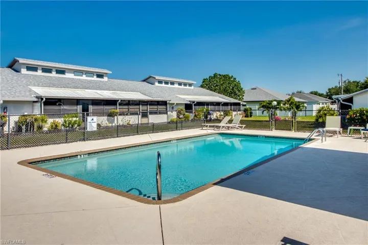 Community pool with a patio area