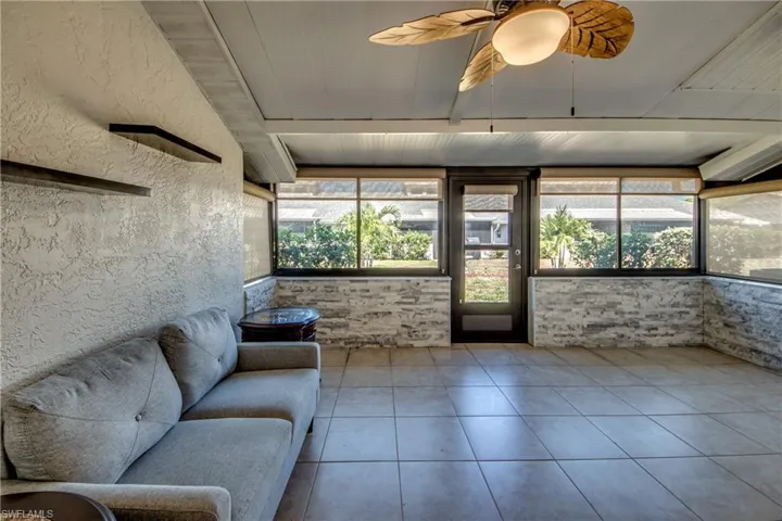 Sunroom with beam ceiling