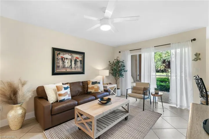 Tiled living room with ceiling fan