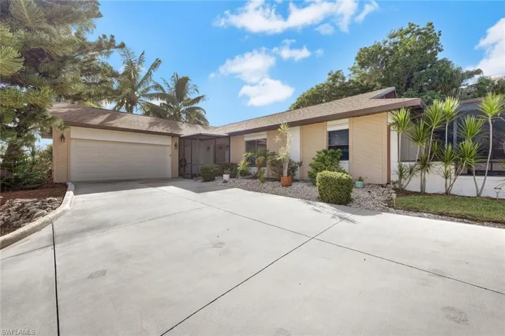 Ranch-style home with a garage
