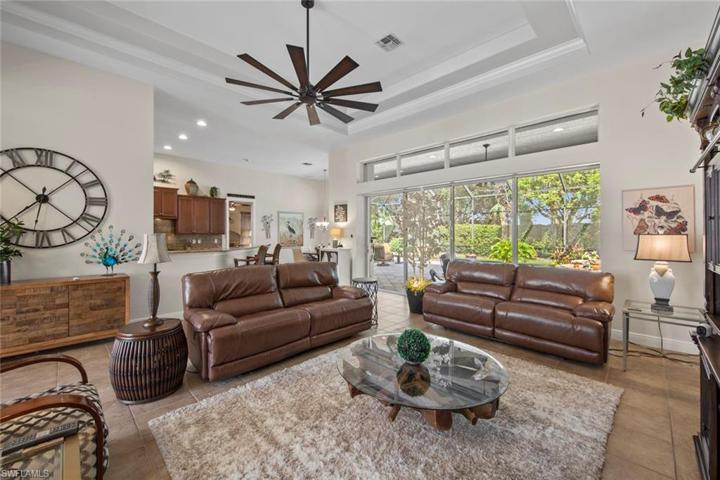 Great room looking through to kitchen + breakfast nook