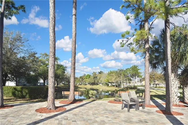 View of patio with a water view