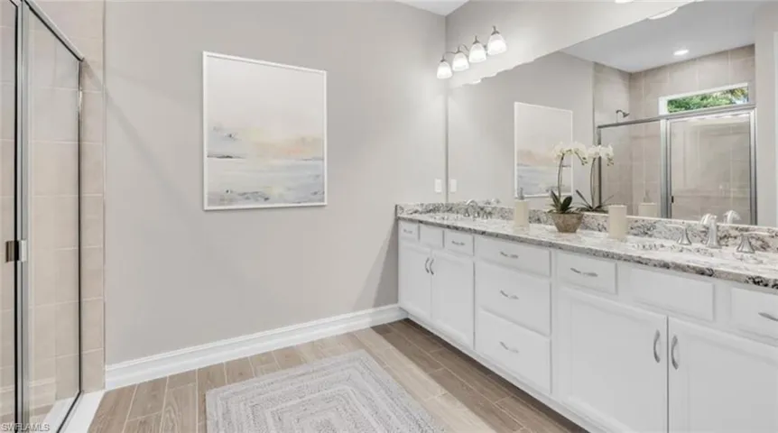 Photo is not of the actual home listed for sale but of a model home.