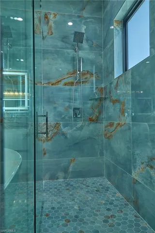 Bathroom with an enclosed shower