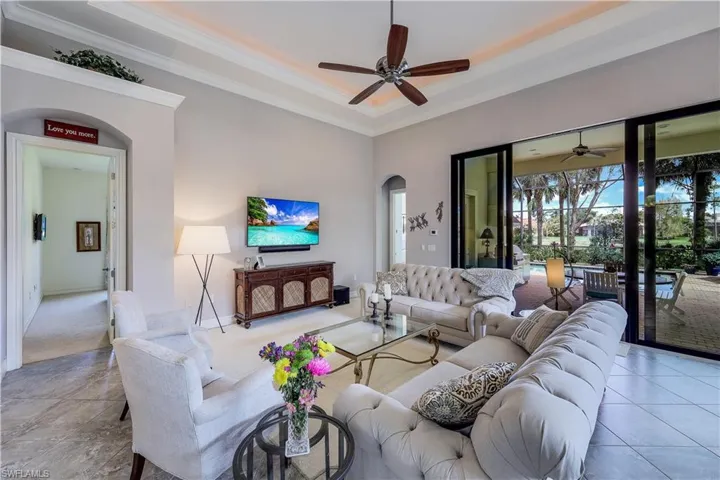 Great room with view to lanai and pool