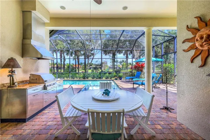 Patio with outdoor kitchen grill