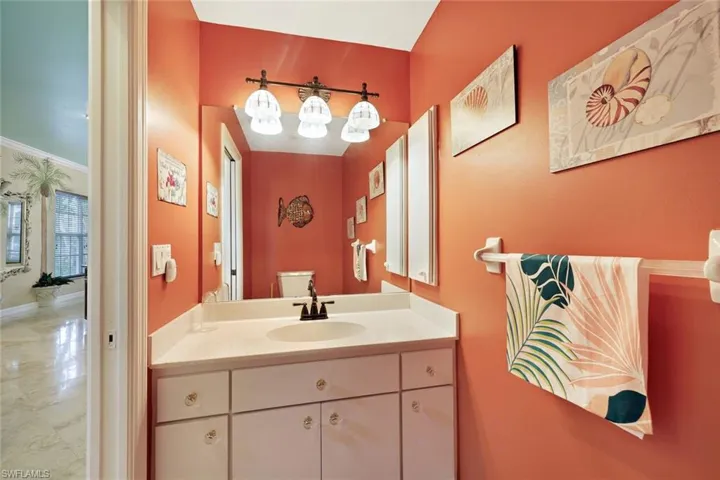 Powder Room located near the Kitchen and Laundry Room