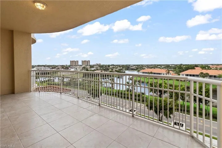 Street side Balcony featuring a water view