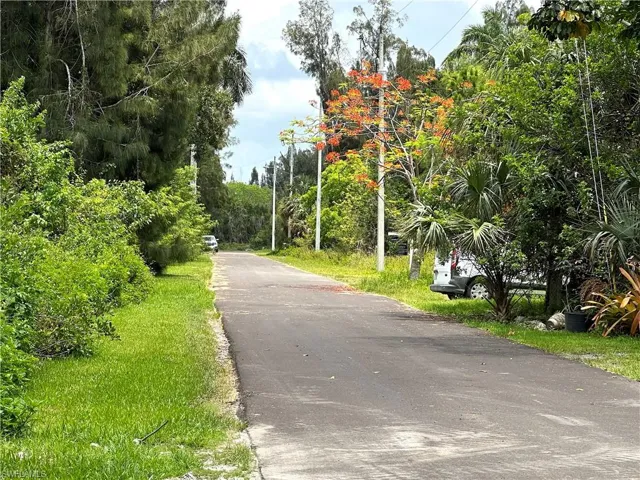 View back up the road towards entrance into street.