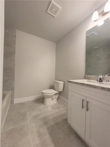 104 E 9th ST, LEHIGH ACRES FL 33972