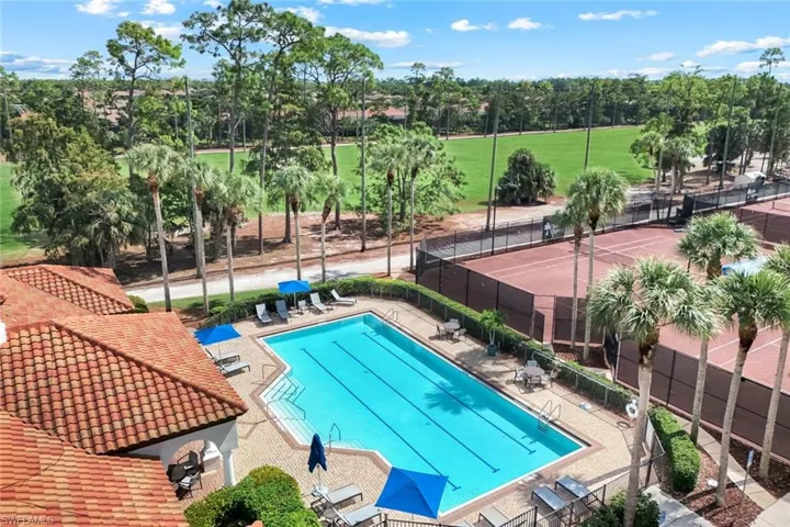Community pool with a patio area