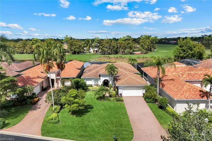 Aerial perspective of suburban area featuring a tree filled landscape