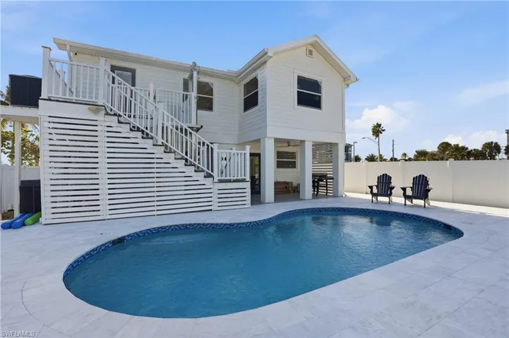 View of swimming pool with stairway Virtually Edited