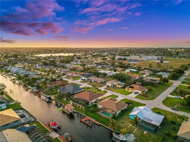 Aerial view at dusk of a residential view and a water view