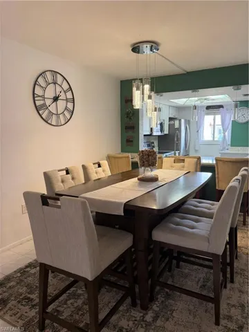 Dining space featuring baseboards