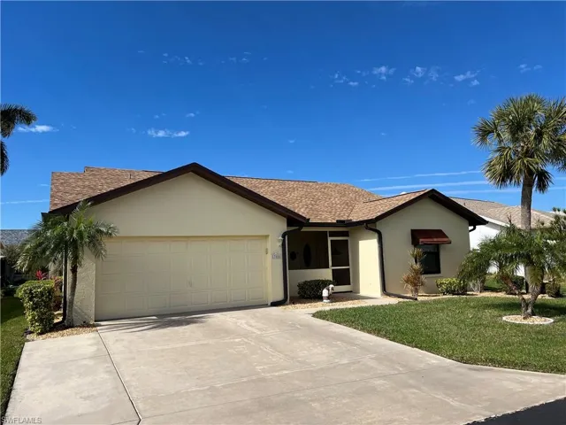 NEW ROOF  2021, ALL NEW IMPACT RATED HURRICANE WINDOWS- OCT 2023. 2 CAR GARAGE WITH OVER-SIZED EXTENDED DRIVEWAY.