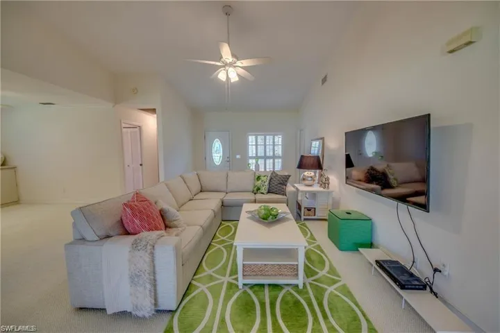 LIVING ROOM LOOKING TO ENTRY.