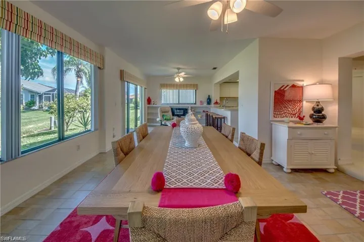 DINING AREA SHARES THE HUGE FAMILY ROOM.