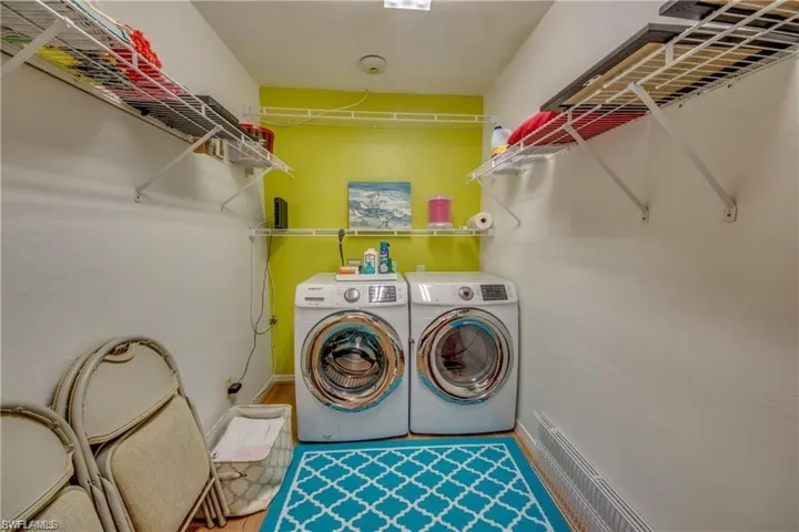 LARGE LAUNDRY ROOM WITH FRONT LOADING WASHER AND DRYER 2017.