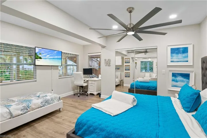 Spacious downstairs bedroom featuring a convenient spot for a laptop desk — perfect for guests, work, or study.