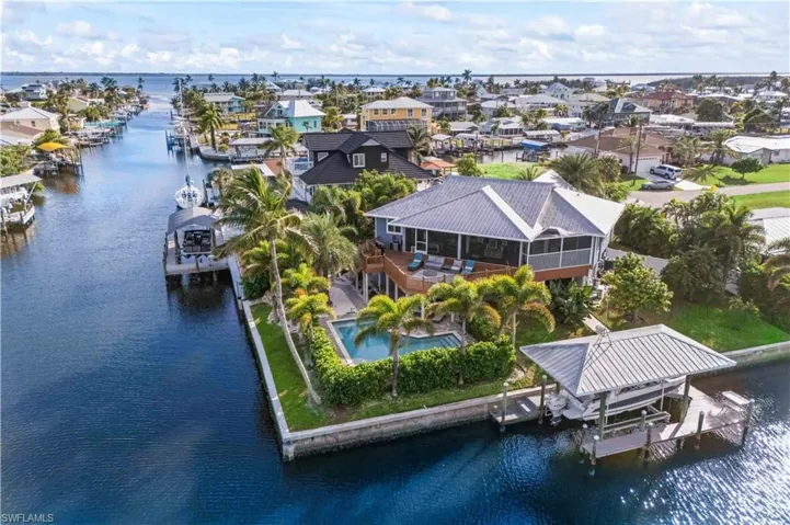 View of the home and its just a minute down the canal to open waters!