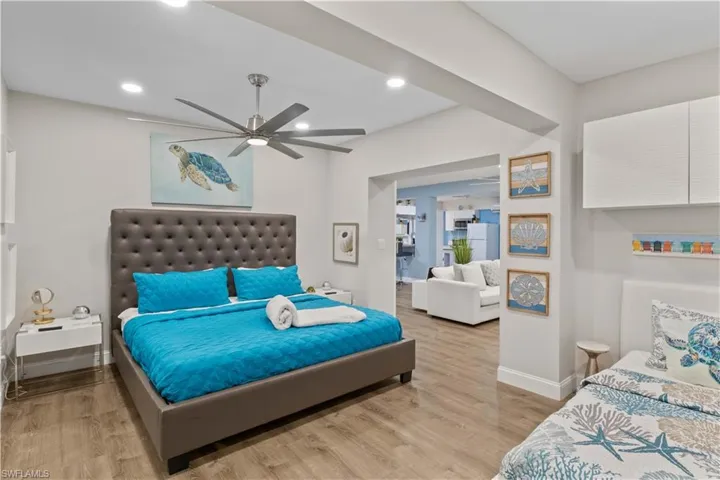 Spacious downstairs bedroom featuring a main bed and an extra bed, perfect for guests or extended family. Bright, comfortable, and easily accessible from the main living area.