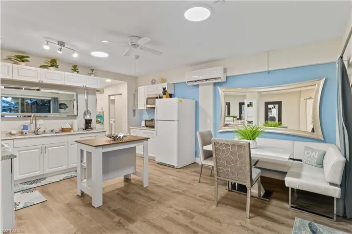 Downstairs kitchen and eating area!  Beautiful design and gorgeous furniture complete this living space!