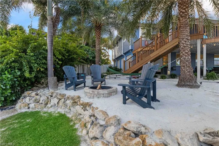 Another charming outdoor area with firepit and amazing views!  Kick back and relax and enjoy the wonderful island life!