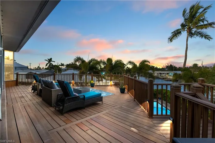 Enjoy cocktails by the pool as the sun sets over the canals—paradise found!
