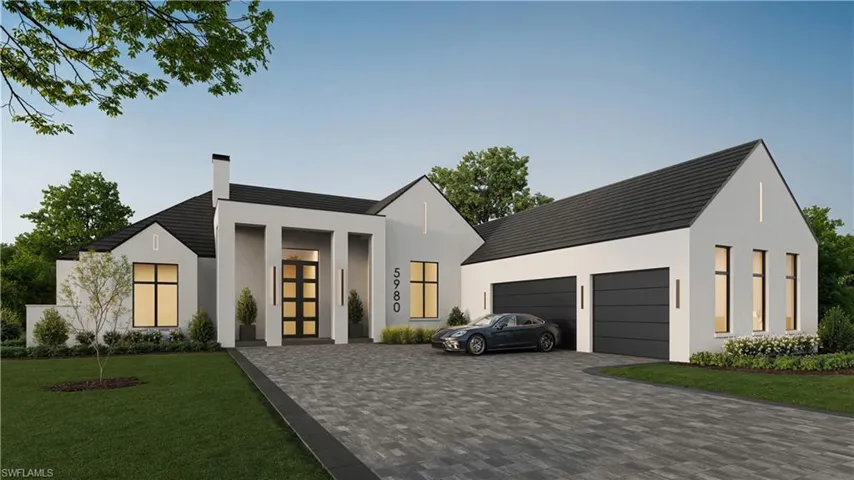 Contemporary home with a chimney, decorative driveway, a front lawn, stucco siding, and a garage