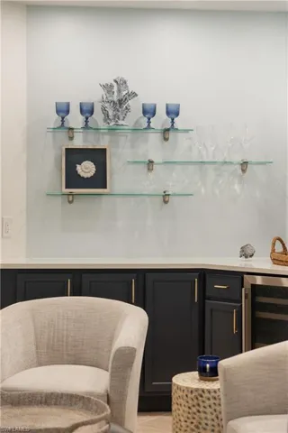 Bar featuring beverage cooler