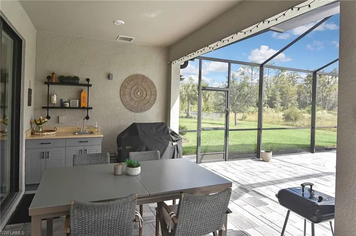 Sunroom with a sink