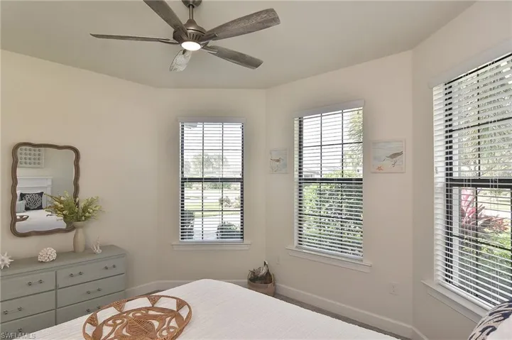 Bedroom featuring baseboards and a ceiling fan