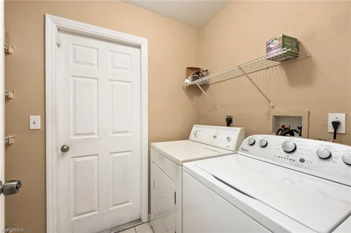 Laundry area featuring washing machine and dryer
