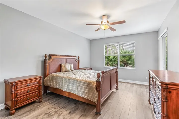 Primary Bedroom has sliders out to Lanai
