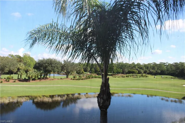 Water view with a local golf course and a tree filled landscape