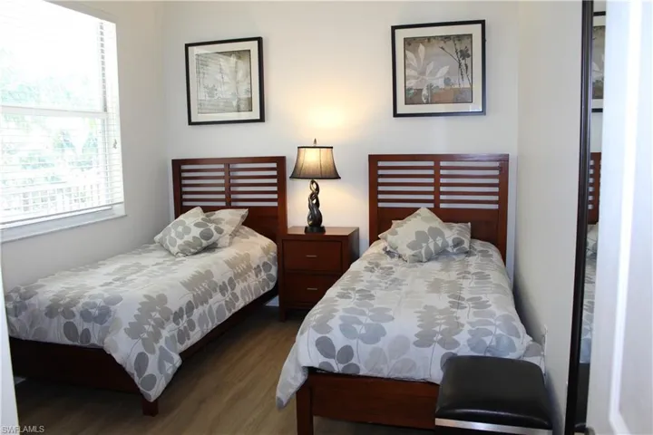 Bedroom with wood finished floors