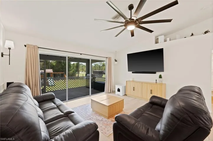Light wood-finish flooring complements the neutral wall tones