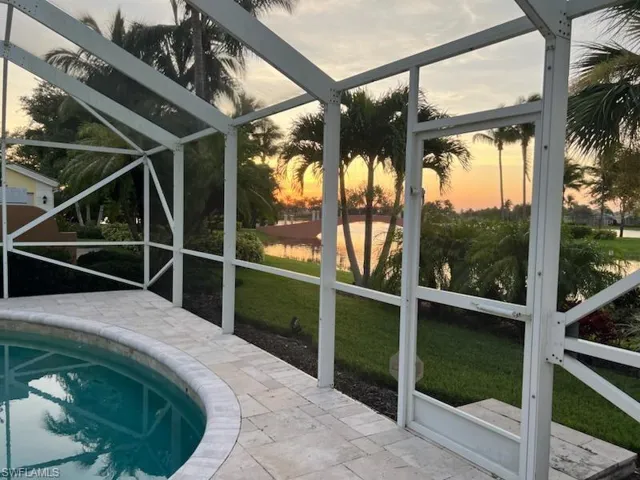 Sunroom featuring a hot tub