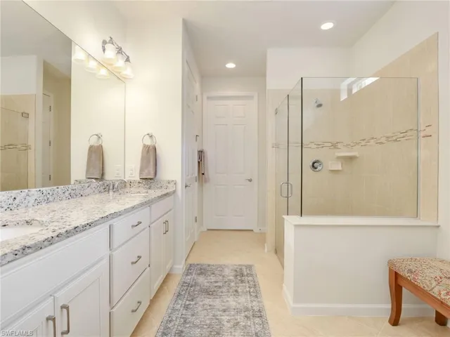 Primary Bathroom with Souble Vanity and Walk-in Closet