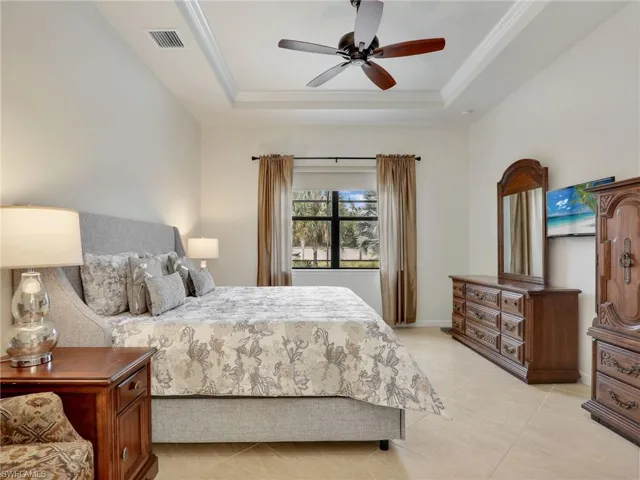 Spacious Primary Bedroom with Tile & Tray Ceiling