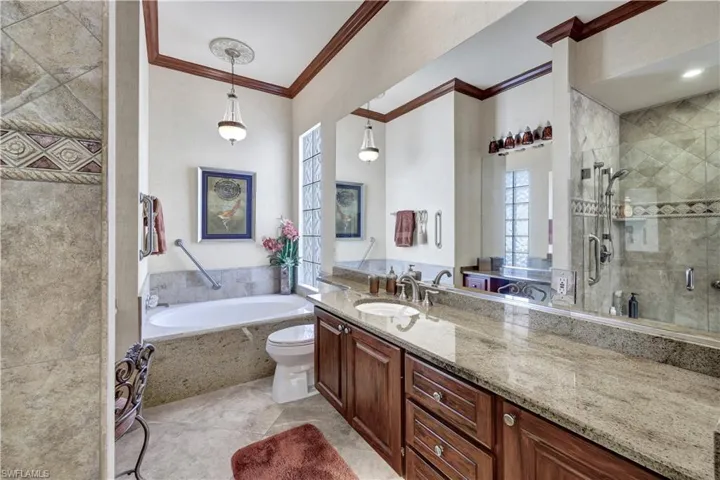 Primary Main Bathroom with shower and tub