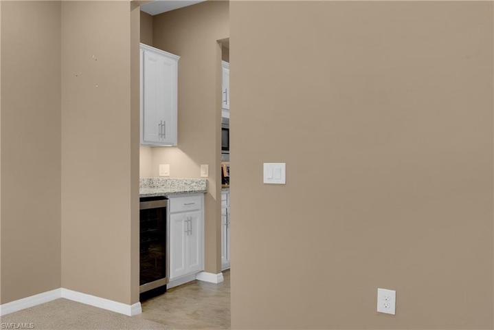 Butler Pantry w/ Beverage Cooler Across From Walk-In Pantry