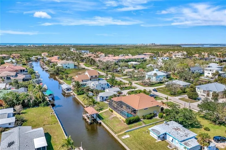 Aerial view with a residential view and a water view