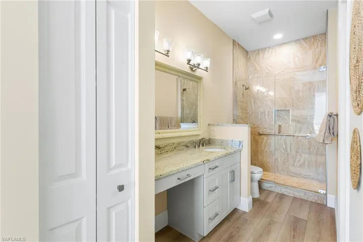2nd full bathroom is ensuite.  Dressing area and granite countertops.