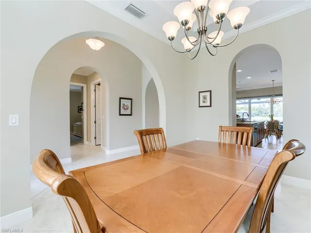Gorgeous arched hallways and tall ceilings - indicative of WCI homes