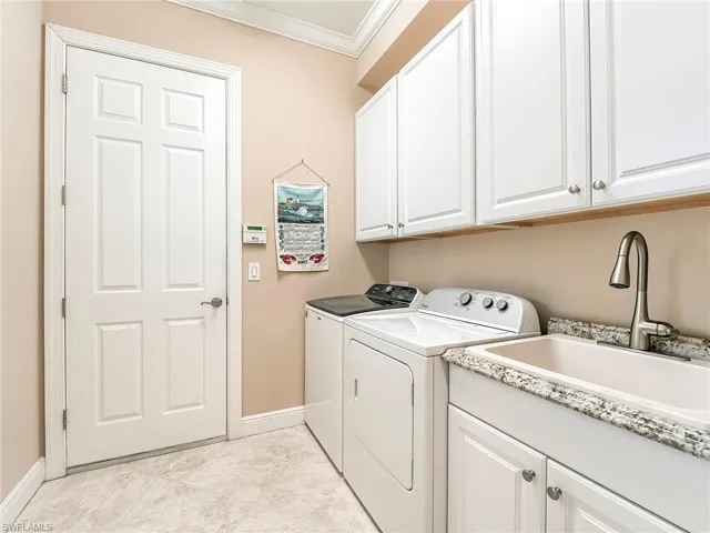 Extra storage and large sink provide additional utility.  Washer replaced in 4/24 and AC 5/24