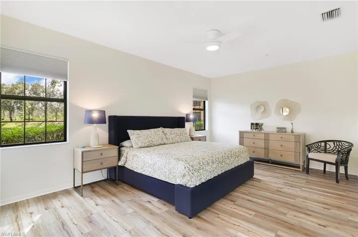 Bedroom featuring light wood finished floors and ceiling fan