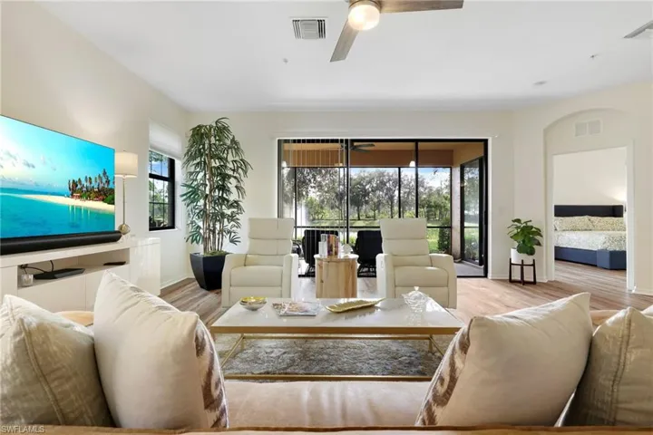 Living room with wood finished floors and baseboards